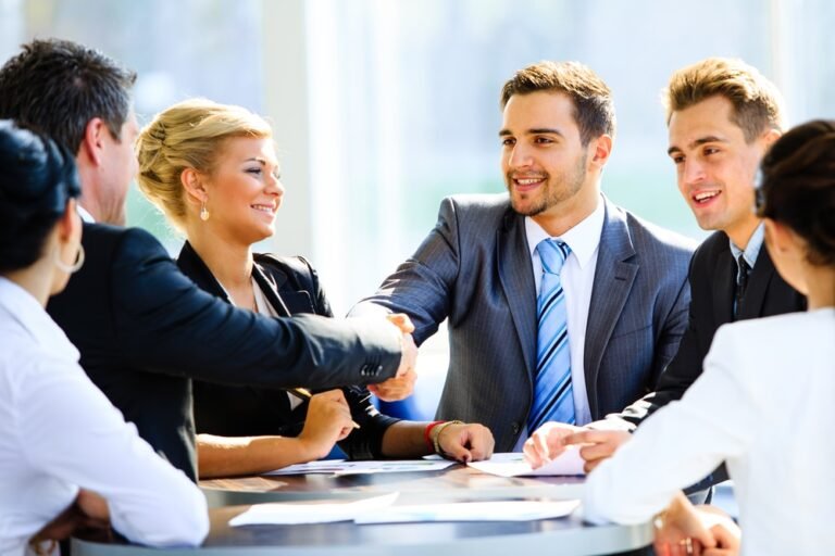 Lawyers shaking hands during a business meeting